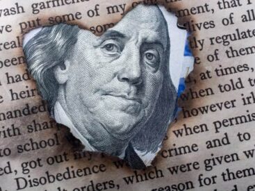 Benjamin Franklin's face against a book page