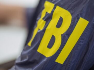 FBI inscription on the sleeve, close-up view