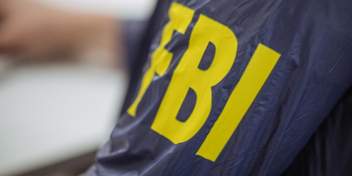 FBI inscription on the sleeve, close-up view