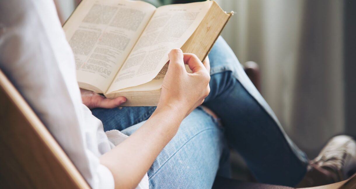 Close up of woman reading book