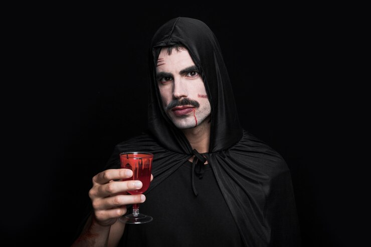 Man with Horror Makeup Posing with Glass