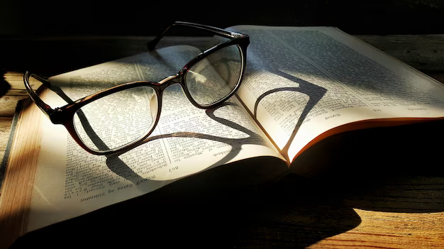 Glasses on books